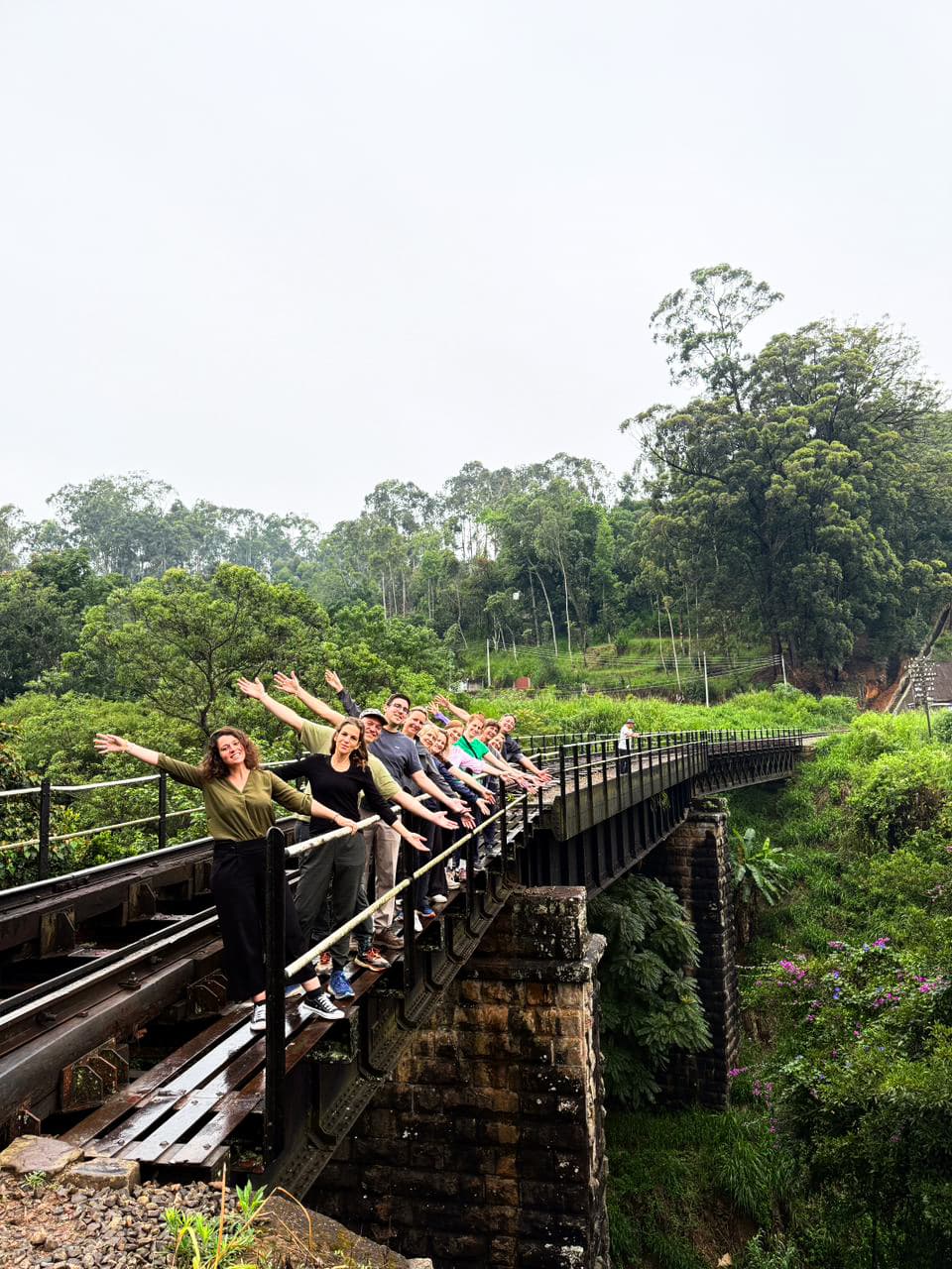 Guests enjoying a guided walk beside the hill-country railway