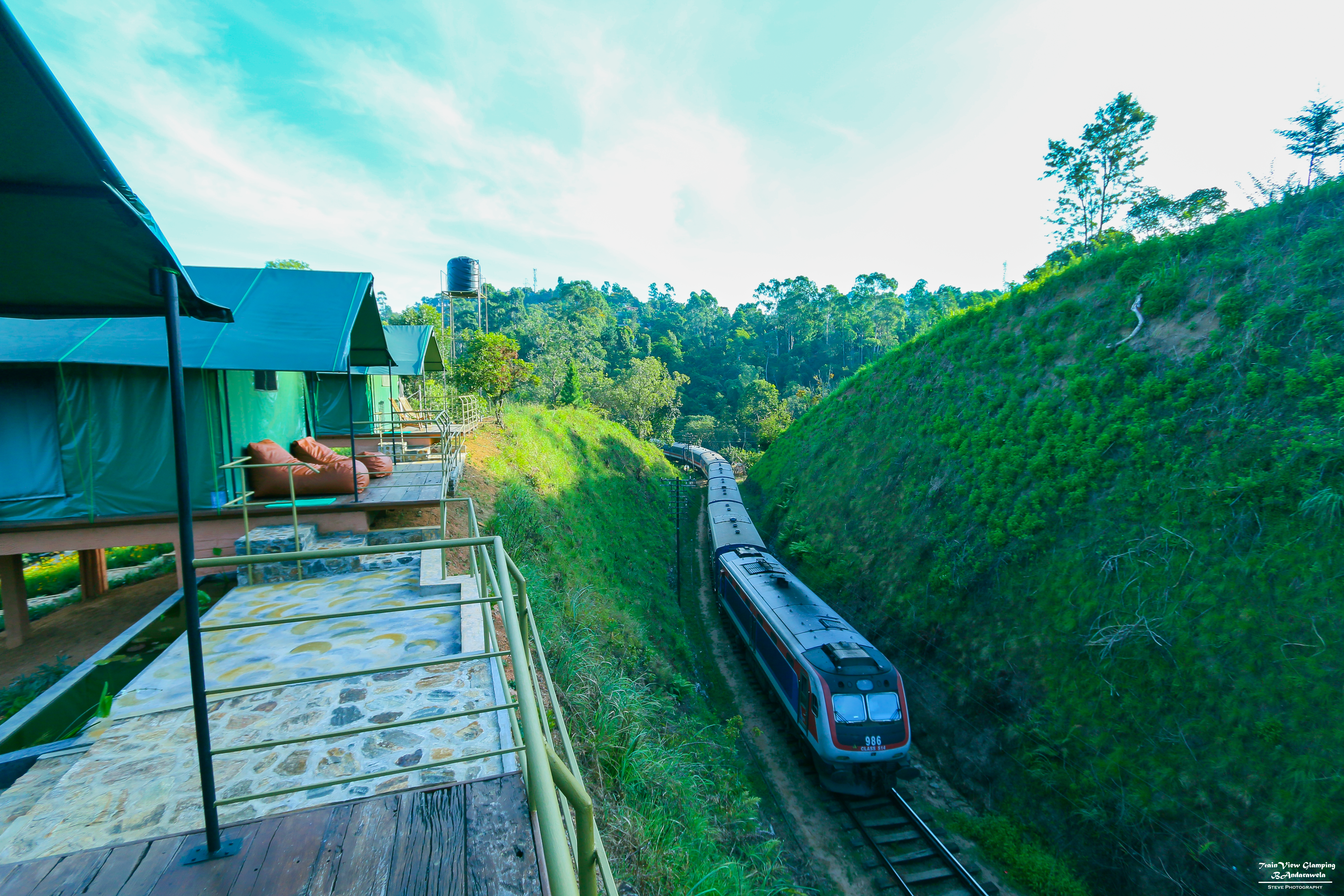 Train passing beside the glamping deck