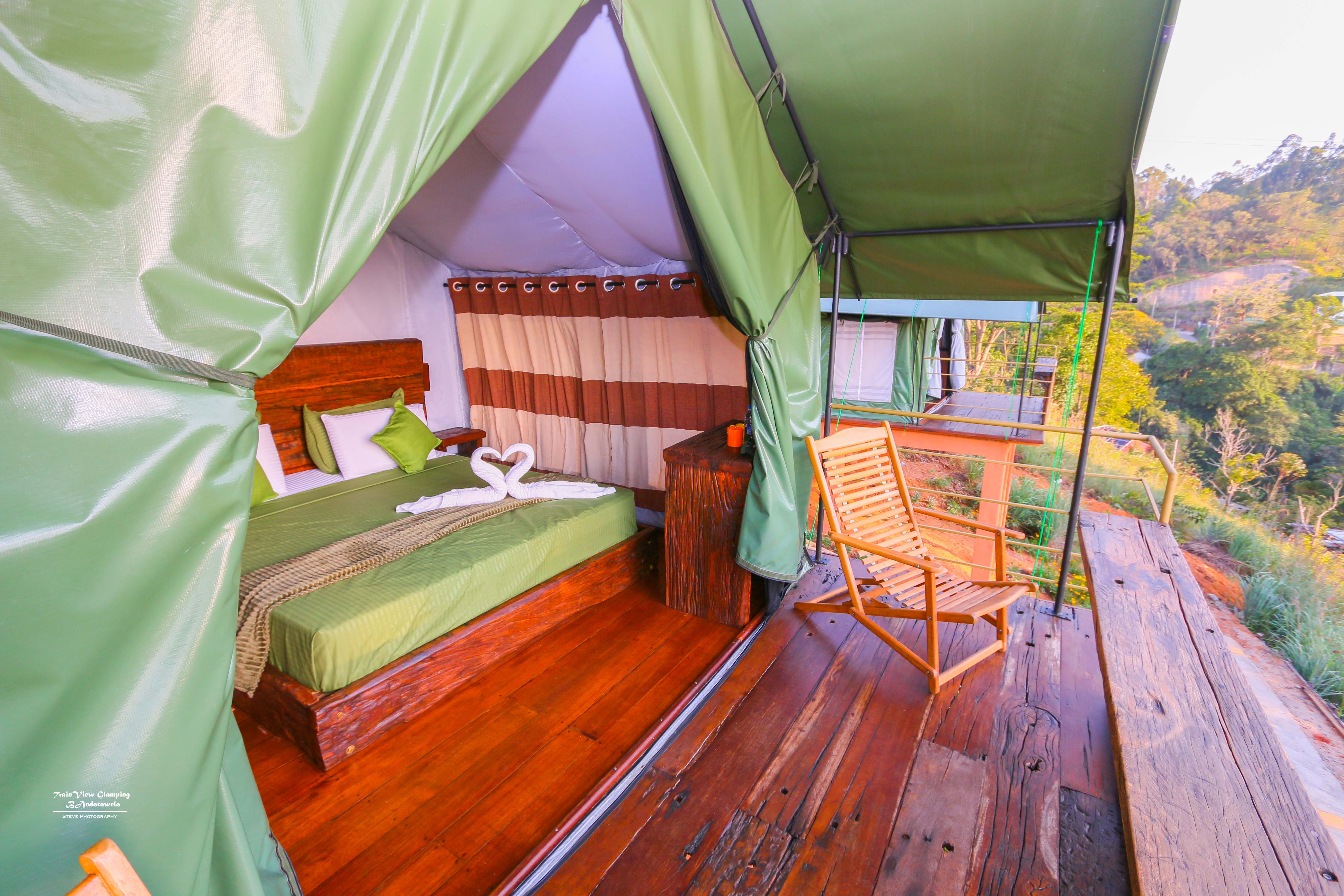 Comfortable interior of a rail-side glamping tent