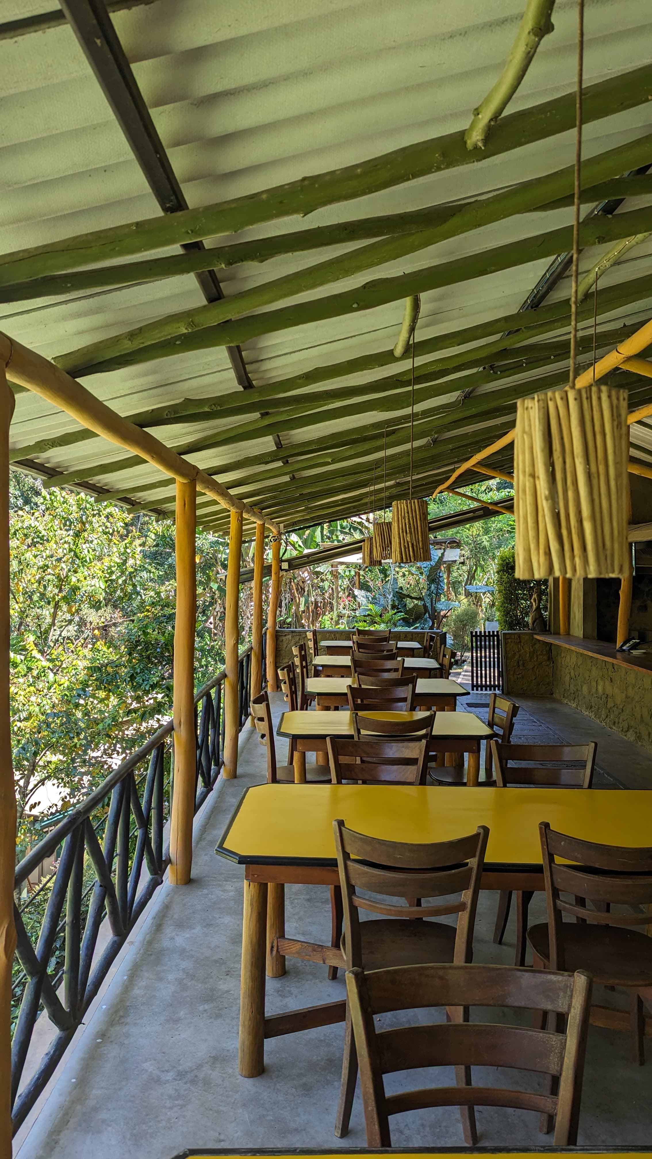 Forest-side dining terrace at Train View Chalet